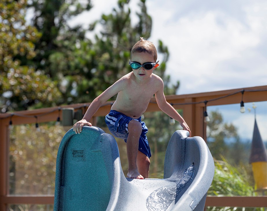Cyclone Pool Slide with Little Boy Thumbnail for Cyclone Pool Slide with Little Boy